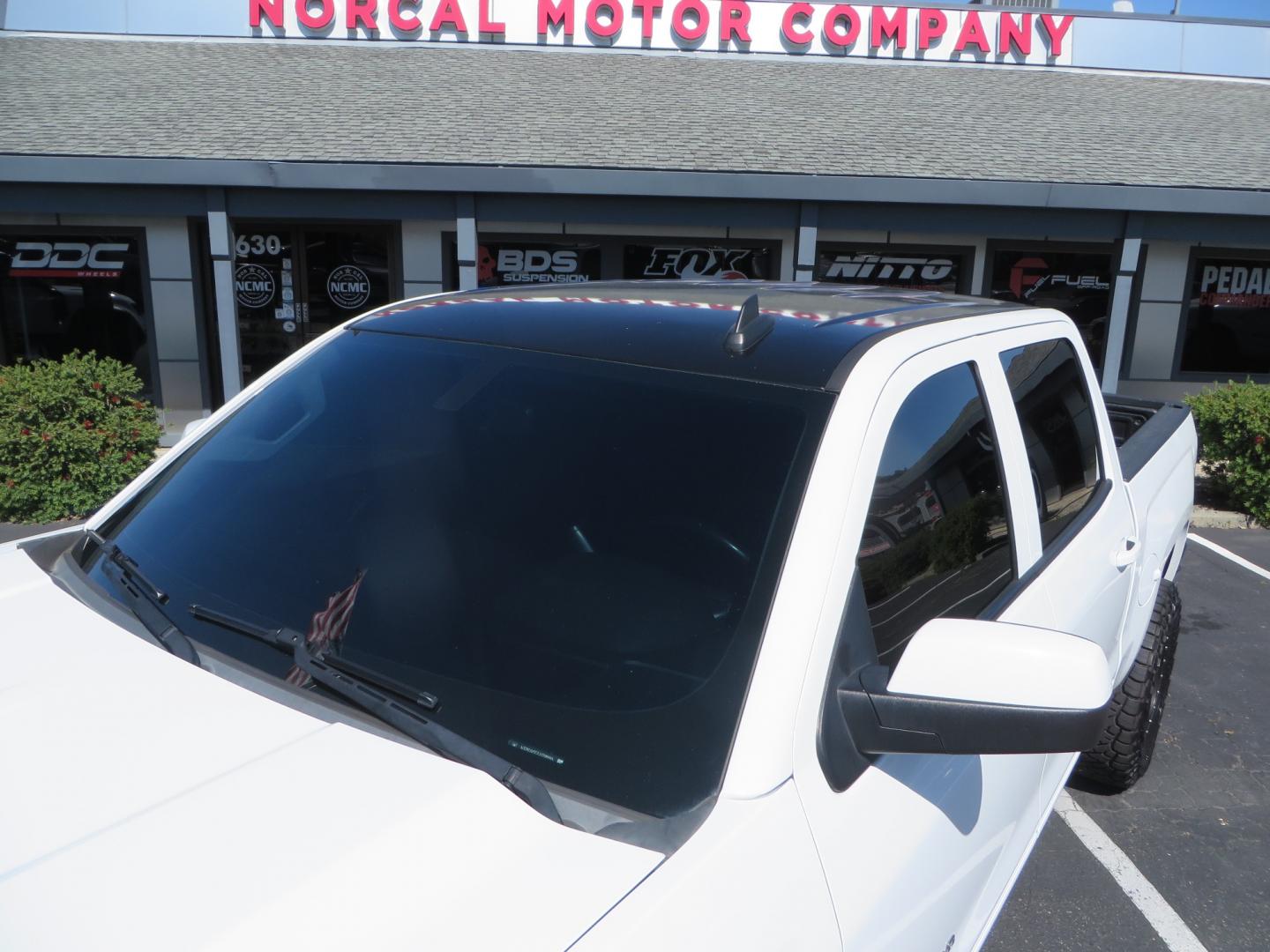 2018 White /BLACK Chevrolet Silverado 1500 LT (3GCPCREC7JG) with an 5.3L V8 OHV 16V engine, automatic transmission, located at 2630 Grass Valley Highway, Auburn, CA, 95603, (530) 508-5100, 38.937893, -121.095482 - Must see Pre Runner.... CST front lift spindals, Camburg UCA's, King Adjustable 2.5 Coil-overs, King 2.5 rear shocks, 35" Toyo RT Trail tires, 17" Method Race wheels, MZ front skid plate, G2 rear differntail cover, Full size bed mounted spare tire, Black Vinyl roof wrap, smoke tail lights and 3rd br - Photo#12